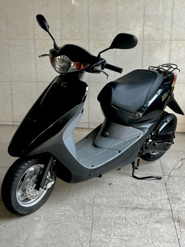 Honda Dio 50cc ប្រើសាំងសុទ្ធ ប្រាំងប៉ូម មានប្រពន្ធ័ ឈប់រលត់ ម៉ូតូស្អាត សុំនុំសុីន ក្រដាស់ពន្ធ